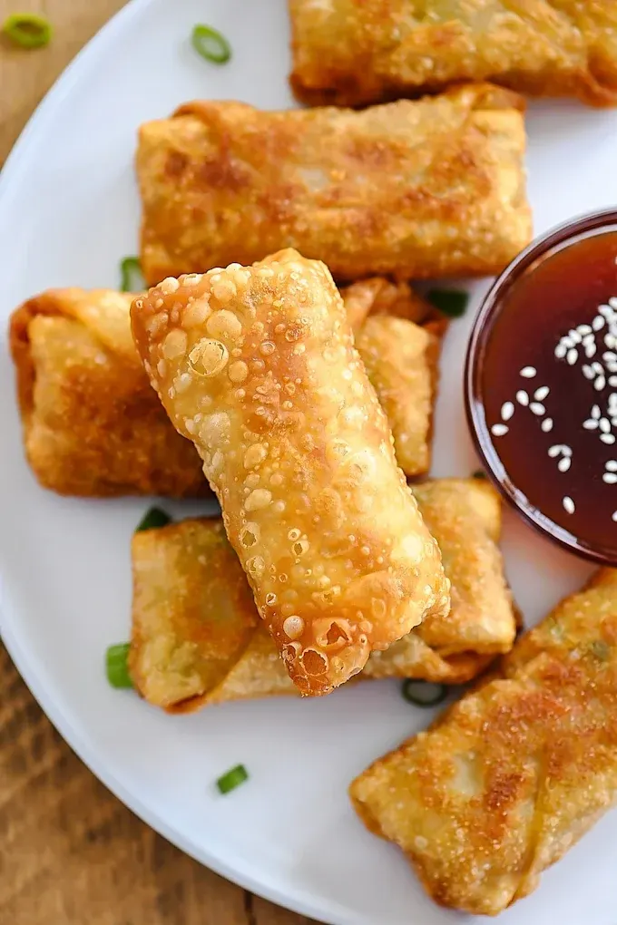 Crispy fried egg rolls with sweet duck sauce